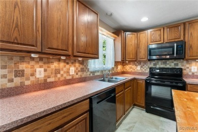 Lovely Two Story, 4 Bedroom Colonial with a 2-Car attached on Hobbs Hole Golf Course in Virginia - for sale on GolfHomes.com, golf home, golf lot