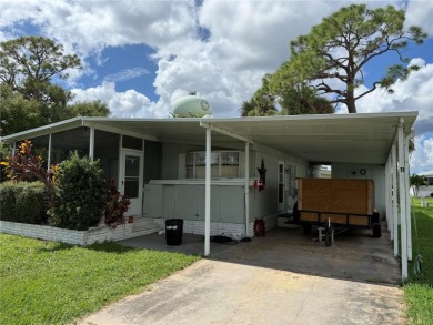 Fixer Upper! Needs TLC! This 960-square-foot doublewide home in on Twin Isles Country Club in Florida - for sale on GolfHomes.com, golf home, golf lot