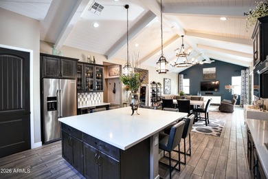 This stunning home has everything! Resort-style pool & spa plus on Verrado Golf Club - Victory in Arizona - for sale on GolfHomes.com, golf home, golf lot