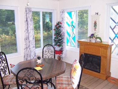 Double Lot, Year round home on private, wooded setting. Located on Burning Oak Country Club in Michigan - for sale on GolfHomes.com, golf home, golf lot