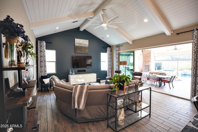 This stunning home has everything! Resort-style pool & spa plus on Verrado Golf Club - Victory in Arizona - for sale on GolfHomes.com, golf home, golf lot