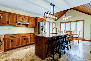 Welcome home to 601 Oak Branch Rd in Louisville's desirable Lake on Lake Forest Country Club in Kentucky - for sale on GolfHomes.com, golf home, golf lot