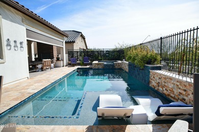 This stunning home has everything! Resort-style pool & spa plus on Verrado Golf Club - Victory in Arizona - for sale on GolfHomes.com, golf home, golf lot