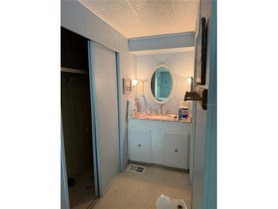 Fixer Upper! Needs TLC! This 960-square-foot doublewide home in on Twin Isles Country Club in Florida - for sale on GolfHomes.com, golf home, golf lot