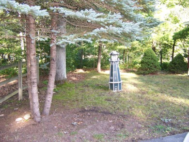 Double Lot, Year round home on private, wooded setting. Located on Burning Oak Country Club in Michigan - for sale on GolfHomes.com, golf home, golf lot