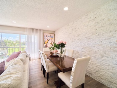 GREENS FEES INCLUDED when you own this SUPER STUNNING FURNISHED on Riverbend Golf Club in Florida - for sale on GolfHomes.com, golf home, golf lot