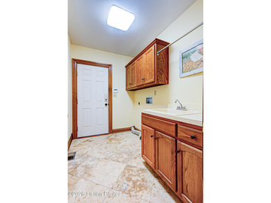 Welcome home to 601 Oak Branch Rd in Louisville's desirable Lake on Lake Forest Country Club in Kentucky - for sale on GolfHomes.com, golf home, golf lot