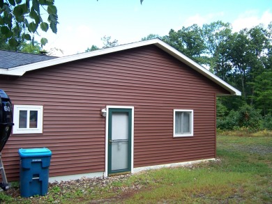 Double Lot, Year round home on private, wooded setting. Located on Burning Oak Country Club in Michigan - for sale on GolfHomes.com, golf home, golf lot