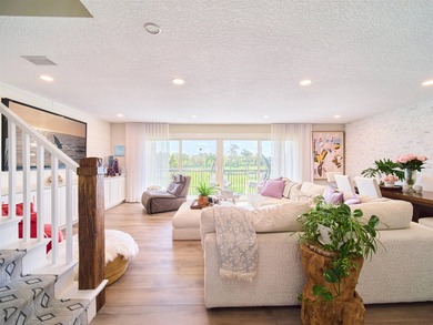 GREENS FEES INCLUDED when you own this SUPER STUNNING FURNISHED on Riverbend Golf Club in Florida - for sale on GolfHomes.com, golf home, golf lot