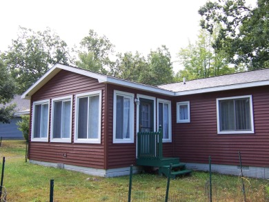 Double Lot, Year round home on private, wooded setting. Located on Burning Oak Country Club in Michigan - for sale on GolfHomes.com, golf home, golf lot