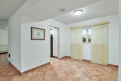 WELCOME TO THIS DESIRABLE CORNER CONDO WITH EASTERLY FACING 23' on Poinciana Golf Club in Florida - for sale on GolfHomes.com, golf home, golf lot