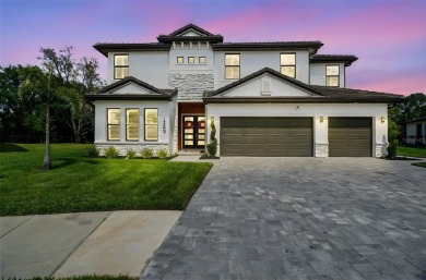 GORGEOUS POOL HOME - PREMIUM LOT - WATERFRONT - GOLF COURSES - on The Eagles Golf Course and Club in Florida - for sale on GolfHomes.com, golf home, golf lot