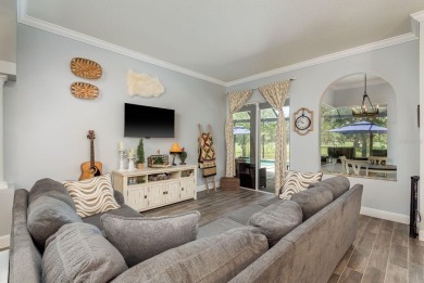 Experience refined Florida living at its finest in this on The Eagles Golf Course and Club in Florida - for sale on GolfHomes.com, golf home, golf lot