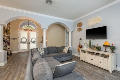 Experience refined Florida living at its finest in this on The Eagles Golf Course and Club in Florida - for sale on GolfHomes.com, golf home, golf lot