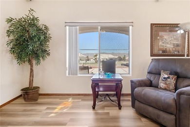 Welcome to this beautifully maintained 3-bedroom, 2-bath home on Desert Lakes Golf Course in Arizona - for sale on GolfHomes.com, golf home, golf lot