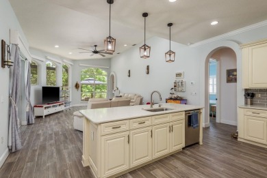 Experience refined Florida living at its finest in this on The Eagles Golf Course and Club in Florida - for sale on GolfHomes.com, golf home, golf lot