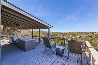 Perched on a scenic hilltop with sweeping views of Lake LBJ and on Apple Rock Golf Course - Horseshoe Bay in Texas - for sale on GolfHomes.com, golf home, golf lot