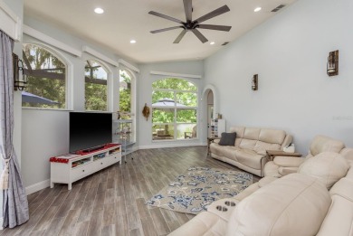 Experience refined Florida living at its finest in this on The Eagles Golf Course and Club in Florida - for sale on GolfHomes.com, golf home, golf lot