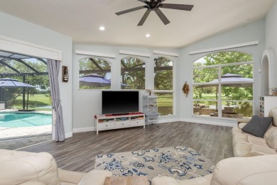 Experience refined Florida living at its finest in this on The Eagles Golf Course and Club in Florida - for sale on GolfHomes.com, golf home, golf lot