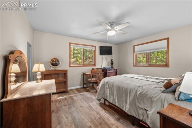 Nestled among towering pines in the prestigious Perry Park golf on Perry Park Country Club in Colorado - for sale on GolfHomes.com, golf home, golf lot