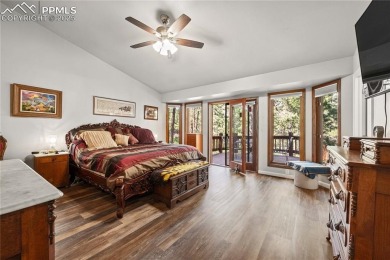 Nestled among towering pines in the prestigious Perry Park golf on Perry Park Country Club in Colorado - for sale on GolfHomes.com, golf home, golf lot