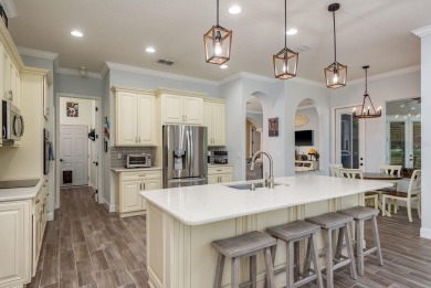 Experience refined Florida living at its finest in this on The Eagles Golf Course and Club in Florida - for sale on GolfHomes.com, golf home, golf lot