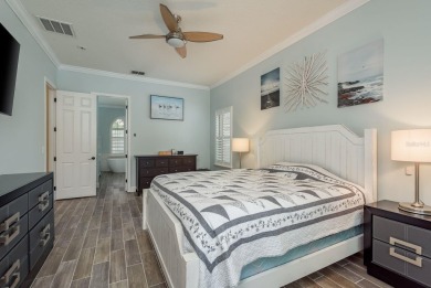 Experience refined Florida living at its finest in this on The Eagles Golf Course and Club in Florida - for sale on GolfHomes.com, golf home, golf lot