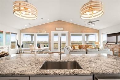 Gorgeous home provides the perfect coastal retreat as an on Palmilla Beach Golf Club in Texas - for sale on GolfHomes.com, golf home, golf lot