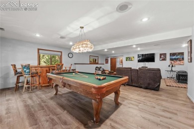 Nestled among towering pines in the prestigious Perry Park golf on Perry Park Country Club in Colorado - for sale on GolfHomes.com, golf home, golf lot