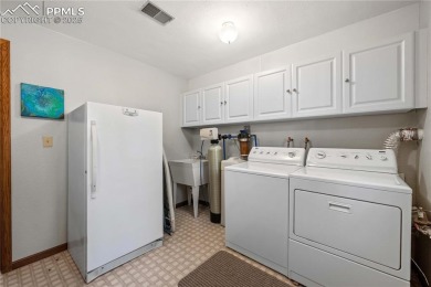 Nestled among towering pines in the prestigious Perry Park golf on Perry Park Country Club in Colorado - for sale on GolfHomes.com, golf home, golf lot
