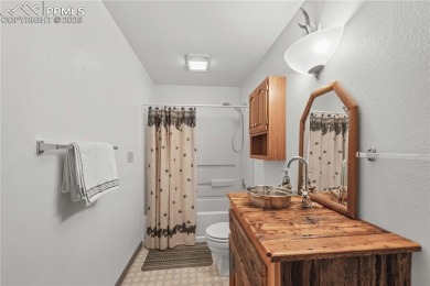 Nestled among towering pines in the prestigious Perry Park golf on Perry Park Country Club in Colorado - for sale on GolfHomes.com, golf home, golf lot
