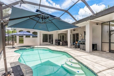 Experience refined Florida living at its finest in this on The Eagles Golf Course and Club in Florida - for sale on GolfHomes.com, golf home, golf lot