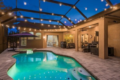 Experience refined Florida living at its finest in this on The Eagles Golf Course and Club in Florida - for sale on GolfHomes.com, golf home, golf lot