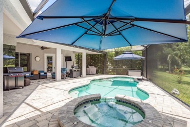 Experience refined Florida living at its finest in this on The Eagles Golf Course and Club in Florida - for sale on GolfHomes.com, golf home, golf lot