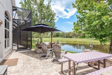 Experience refined Florida living at its finest in this on The Eagles Golf Course and Club in Florida - for sale on GolfHomes.com, golf home, golf lot