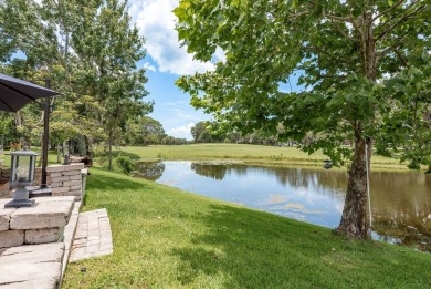 Experience refined Florida living at its finest in this on The Eagles Golf Course and Club in Florida - for sale on GolfHomes.com, golf home, golf lot