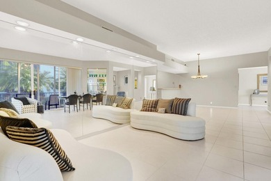 Sunlight pours into this beautifully positioned residence, where on Polo Club of Boca Raton in Florida - for sale on GolfHomes.com, golf home, golf lot