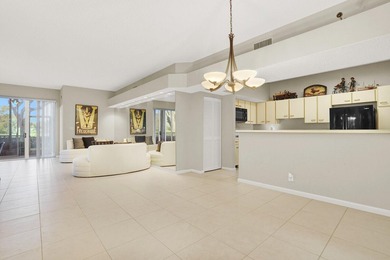 Sunlight pours into this beautifully positioned residence, where on Polo Club of Boca Raton in Florida - for sale on GolfHomes.com, golf home, golf lot