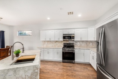 Meticulously renovated home on a generous corner lot in on Springfield Golf Resort in Arizona - for sale on GolfHomes.com, golf home, golf lot
