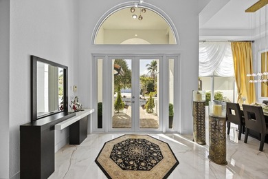 Wow... just wow.This stunning, fully remodeled estate home on Stonebridge Golf and Country Club in Florida - for sale on GolfHomes.com, golf home, golf lot