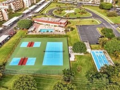 Welcome home to this updated first floor 2 BR/2 BA condo with on Boca Dunes Golf and Country Club in Florida - for sale on GolfHomes.com, golf home, golf lot