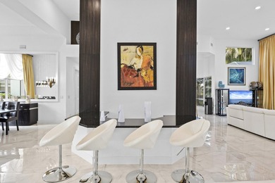 Wow... just wow. This stunning, fully remodeled estate home on Stonebridge Golf and Country Club in Florida - for sale on GolfHomes.com, golf home, golf lot