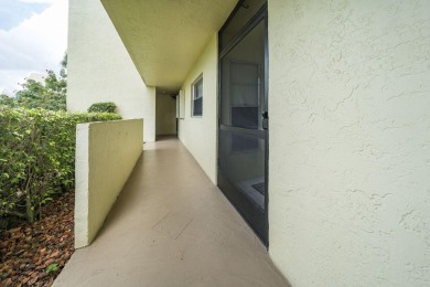 Welcome home to this updated first floor 2 BR/2 BA condo with on Boca Dunes Golf and Country Club in Florida - for sale on GolfHomes.com, golf home, golf lot