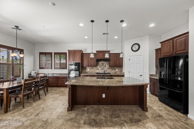 Charming ranch home features 4 bedrooms plus a den. Step inside on Wigwam Golf  Resort Litchfield Park  in Arizona - for sale on GolfHomes.com, golf home, golf lot