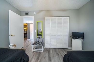 Welcome home to this updated first floor 2 BR/2 BA condo with on Boca Dunes Golf and Country Club in Florida - for sale on GolfHomes.com, golf home, golf lot