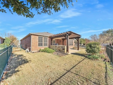 Nestled on a coveted corner lot and backing up to the lush on Frisco Lakes Golf Course in Texas - for sale on GolfHomes.com, golf home, golf lot