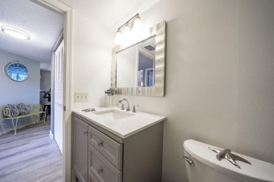 Welcome home to this updated first floor 2 BR/2 BA condo with on Boca Dunes Golf and Country Club in Florida - for sale on GolfHomes.com, golf home, golf lot