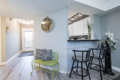 Welcome home to this updated first floor 2 BR/2 BA condo with on Boca Dunes Golf and Country Club in Florida - for sale on GolfHomes.com, golf home, golf lot