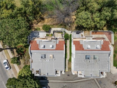 Welcome to this stunning and thoughtfully upgraded townhome on Hansen Dam Golf Course in California - for sale on GolfHomes.com, golf home, golf lot