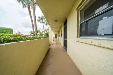 Welcome home to this updated first floor 2 BR/2 BA condo with on Boca Dunes Golf and Country Club in Florida - for sale on GolfHomes.com, golf home, golf lot